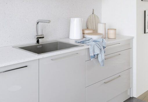 Cerney gloss light grey kitchen cabinets sink, from Riley James Kitchens Stroud