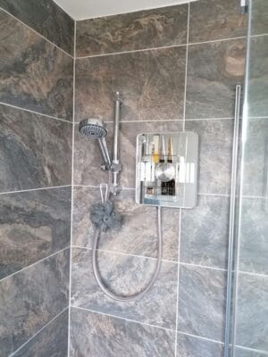 Cam Bathroom - Aqualisa Lumi Electric Shower - from Riley James Bathrooms Stroud