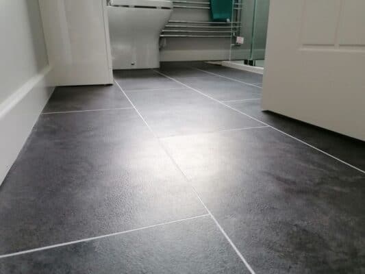 Cam Bathroom - Tarkett Flooring, Sandstone Black - from Riley James Bathrooms Stroud