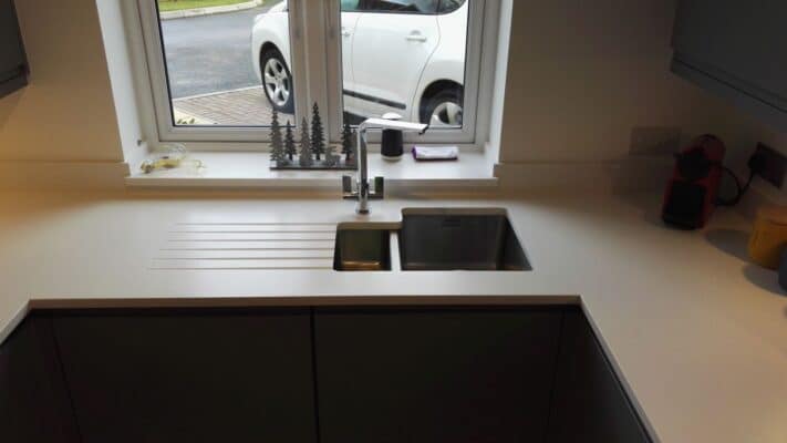 The Siddington Kitchen, Painted Dust Grey - Mistral Polaris Worktop with Undermount Sink ad Draining Groves - Riley James Kitchens, Gloucestershire - Install 1794/16