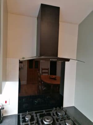 Riley James Malborough Sage Green Installation Curved Extract and Splashback - Riley James Kitchens Stroud